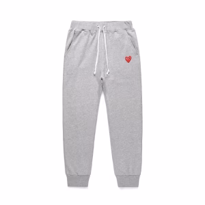 Comme des Garcons Play Red Heart Logo Grey Sweatpants with signature red heart emblem on light grey cotton fleece fabric